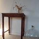 Vintage wooden wheeled side table/console.