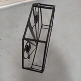 Pink-decorated iron umbrella door.