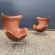 2 vintage Fritz Hansen Egg Chairs in cognac leather, in like-new condition.