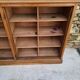 Oak workshop furniture with sliding doors.