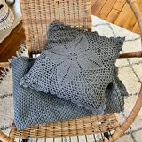 Blue crocheted bedspread and its vintage cushion