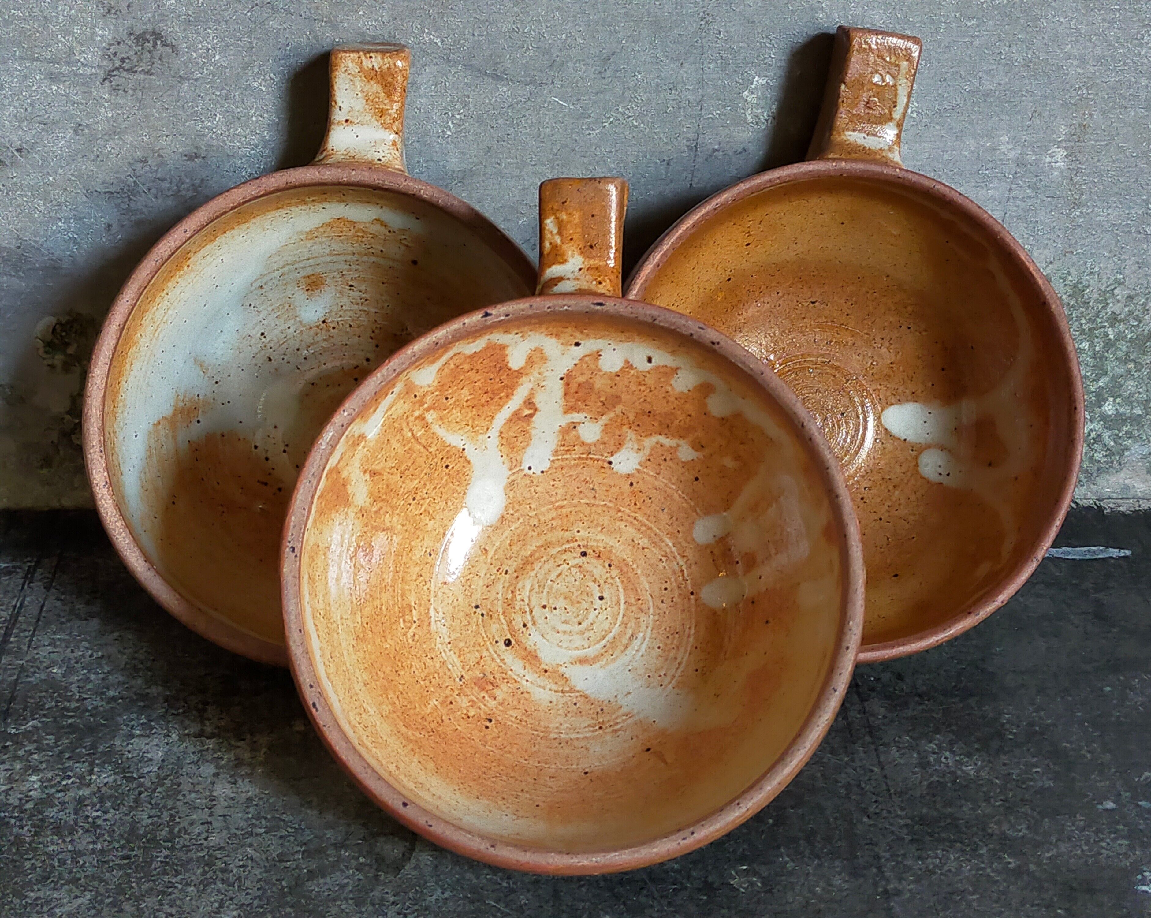 Three vintage marais sandstone bowls