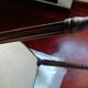 Fauteuil cabriolet Louis XVI couvert cuir marron foncé