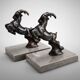 Art Deco bookends with patinated ibex in a taupe marble base.