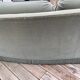 Rounded sofa with fringes