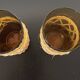 Set of 2 smoked orangeade glasses in woven wicker