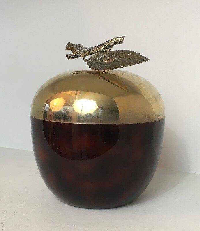 Apple-shaped ice bucket in red celluloid, gold-tone metal and plastic