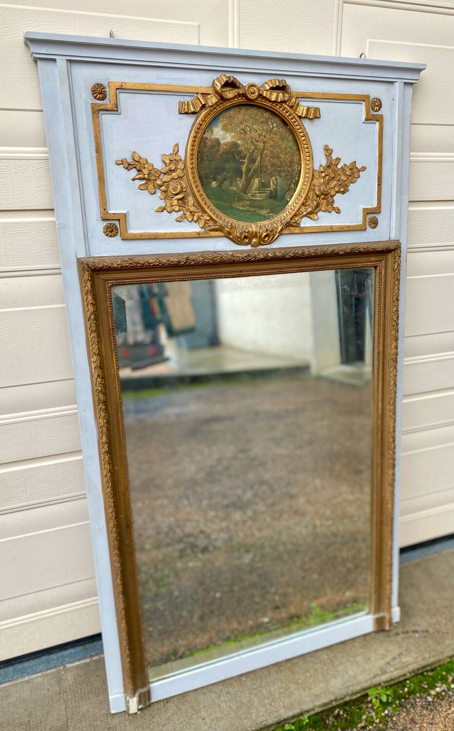 Trumeau mirror with oval decoration and wooden pediment 1920