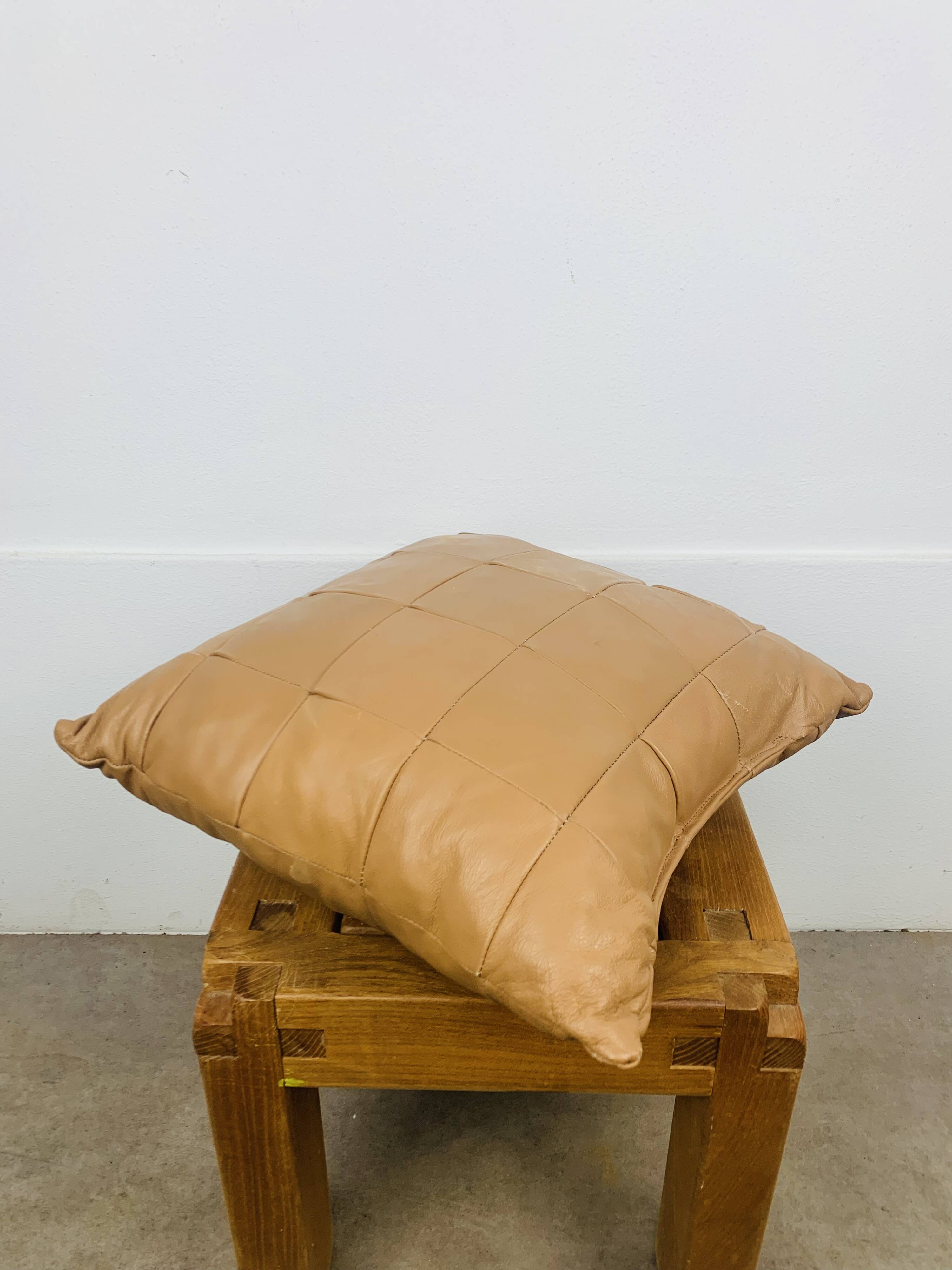 Vintage patchwork leather cushion