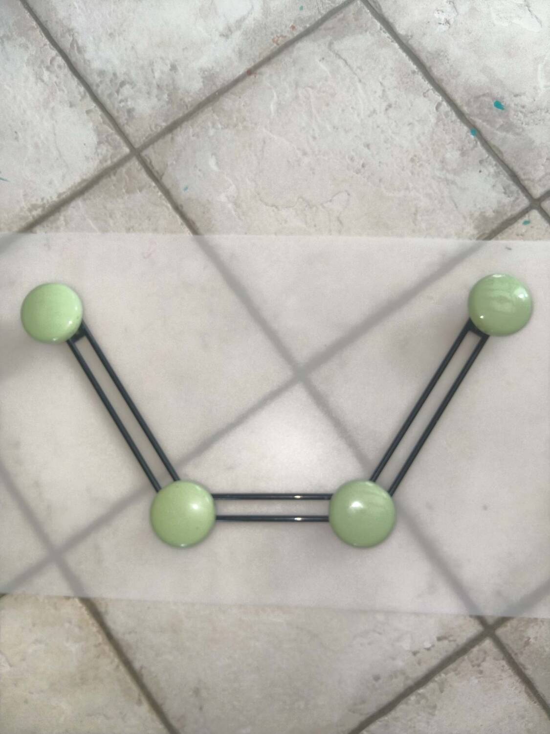 Coat rack with 4 green metal hooks from the 70s