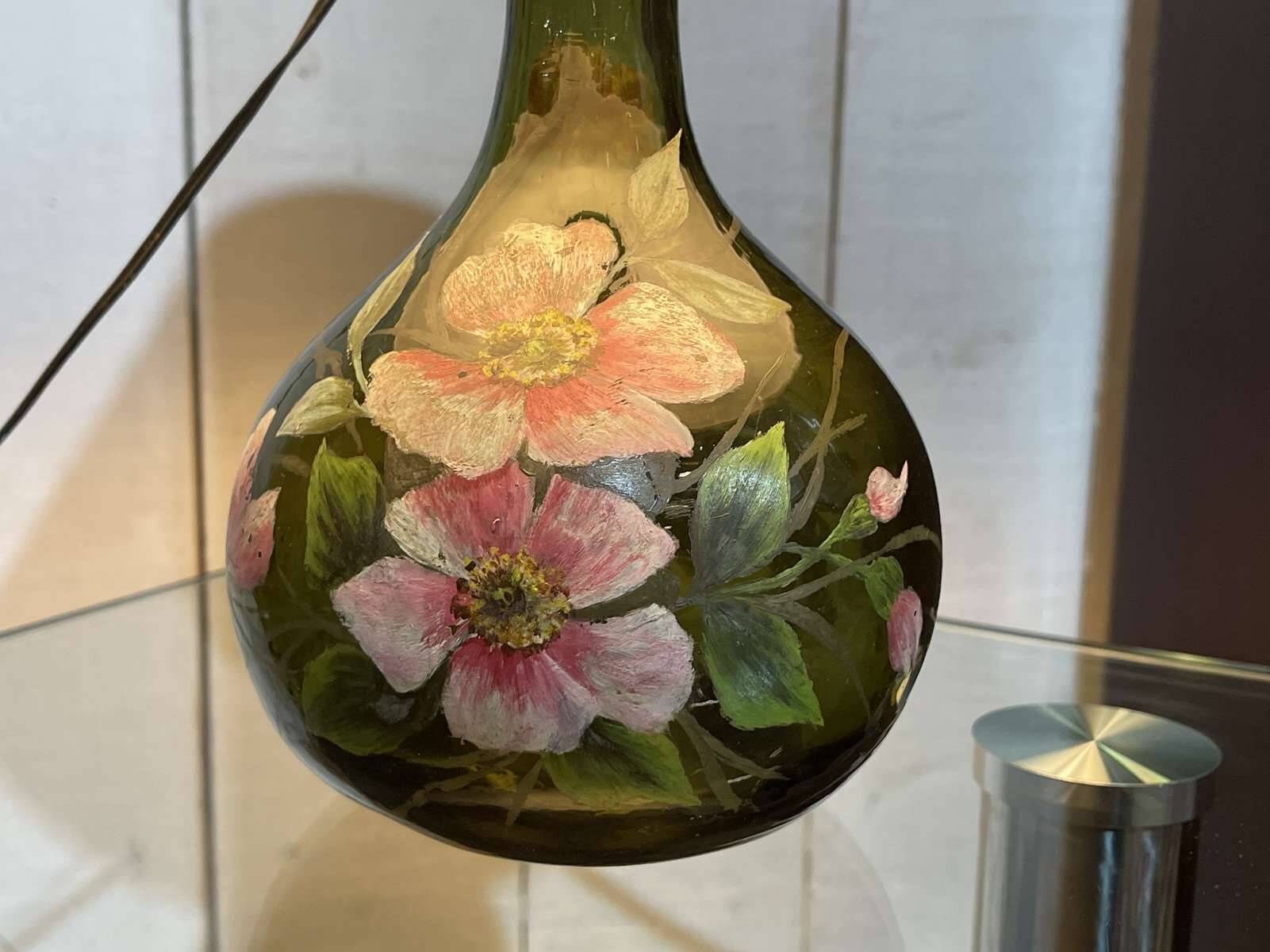 Blown glass lamp painted with a floral design, early 20th century.