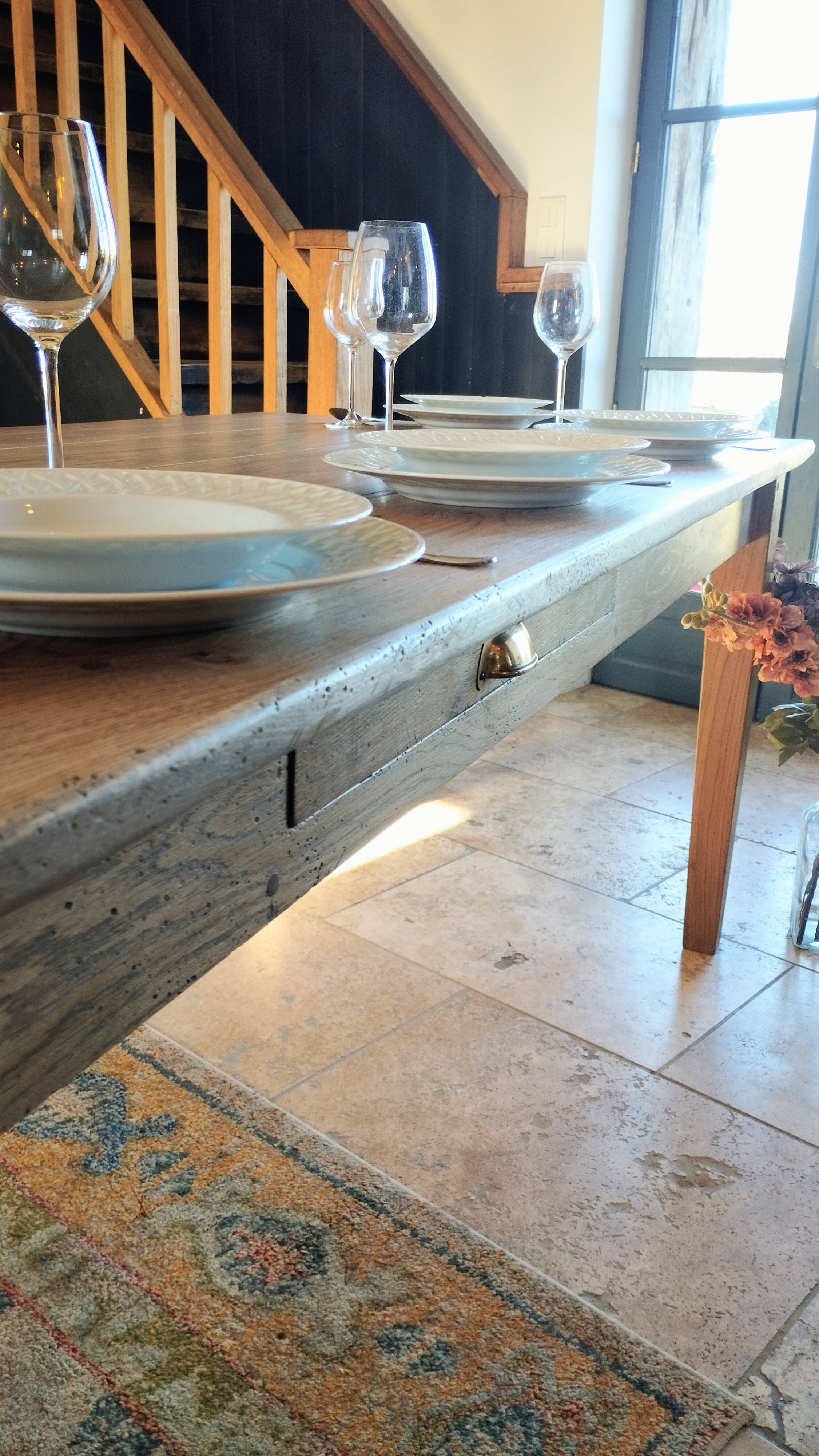 Solid oak farmhouse table with central drawer and extension