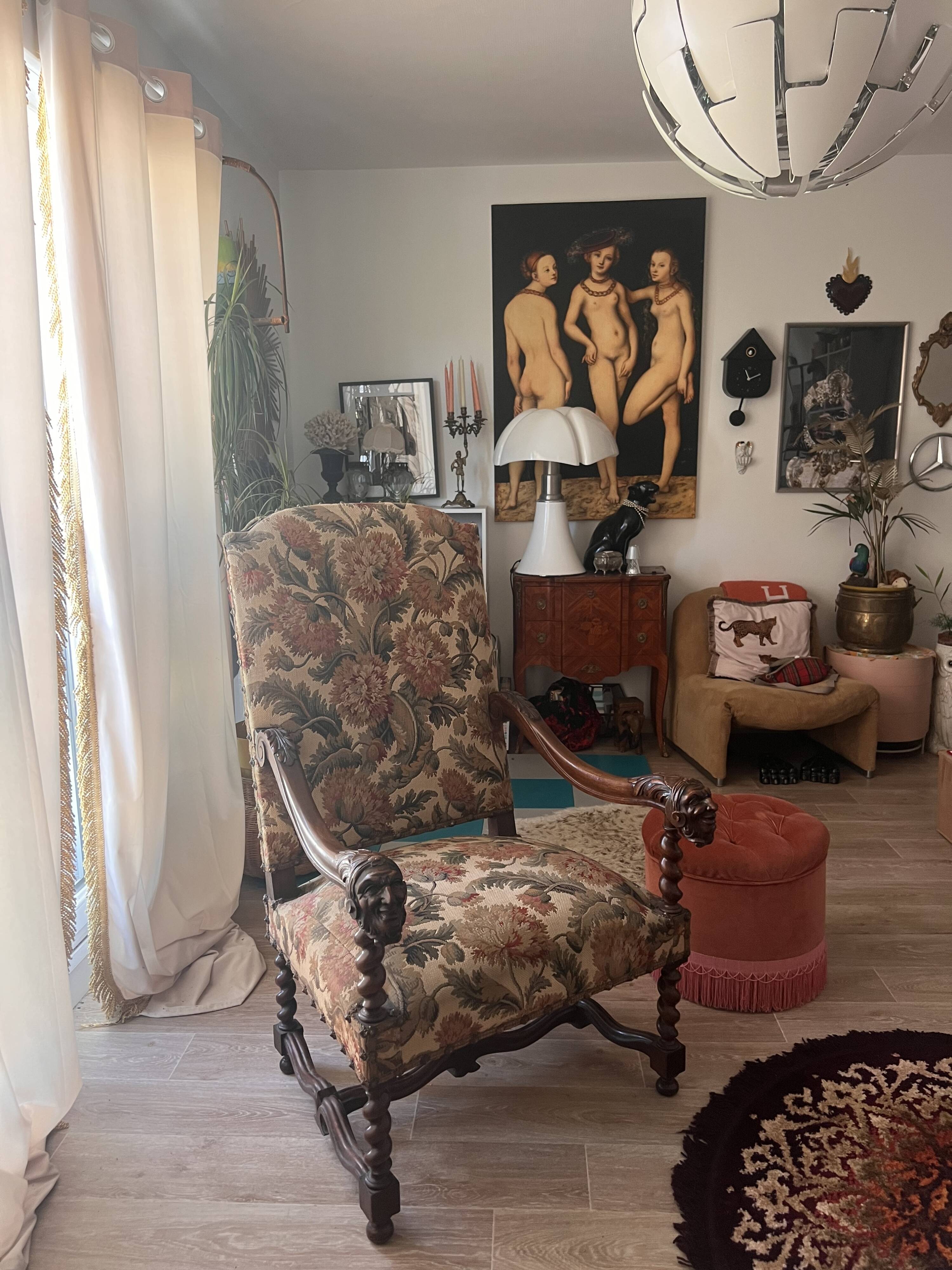 Antique armchair in Henri II style with masks