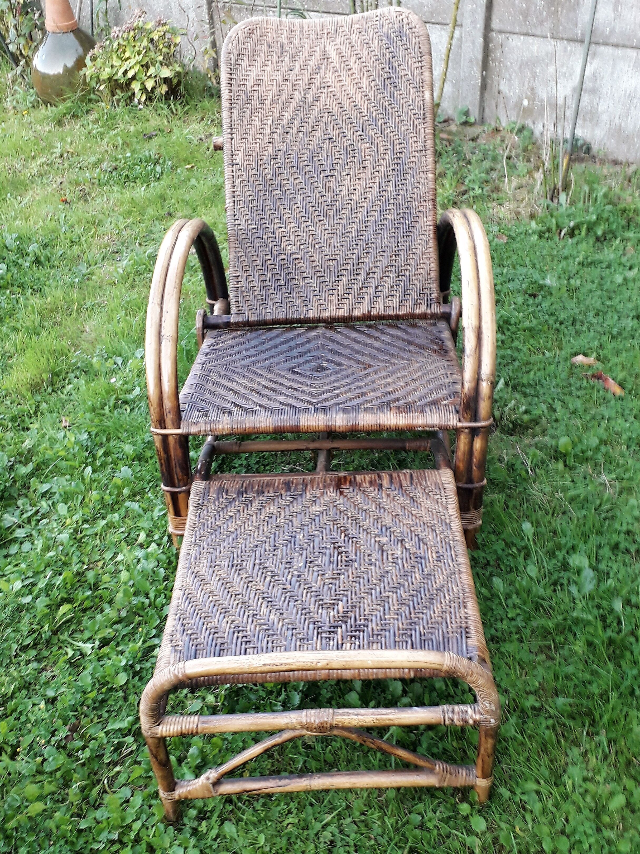 Armchair in rattan with rest foot 60s