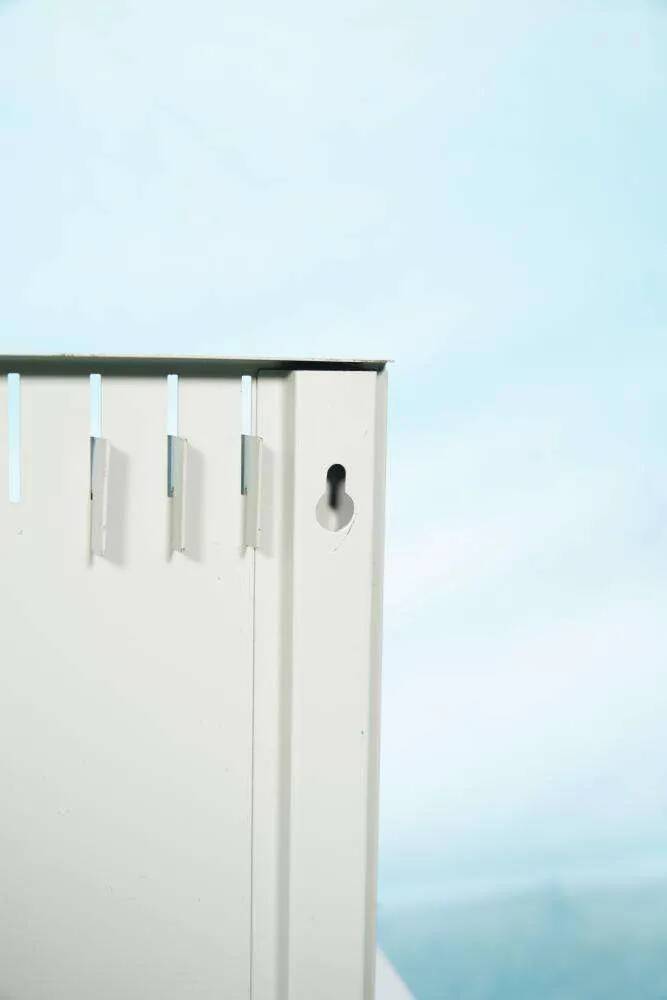 Vintage 1960s metal magazine rack, storage for single LPs.