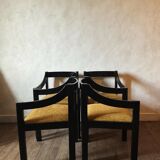 Four designer armchairs