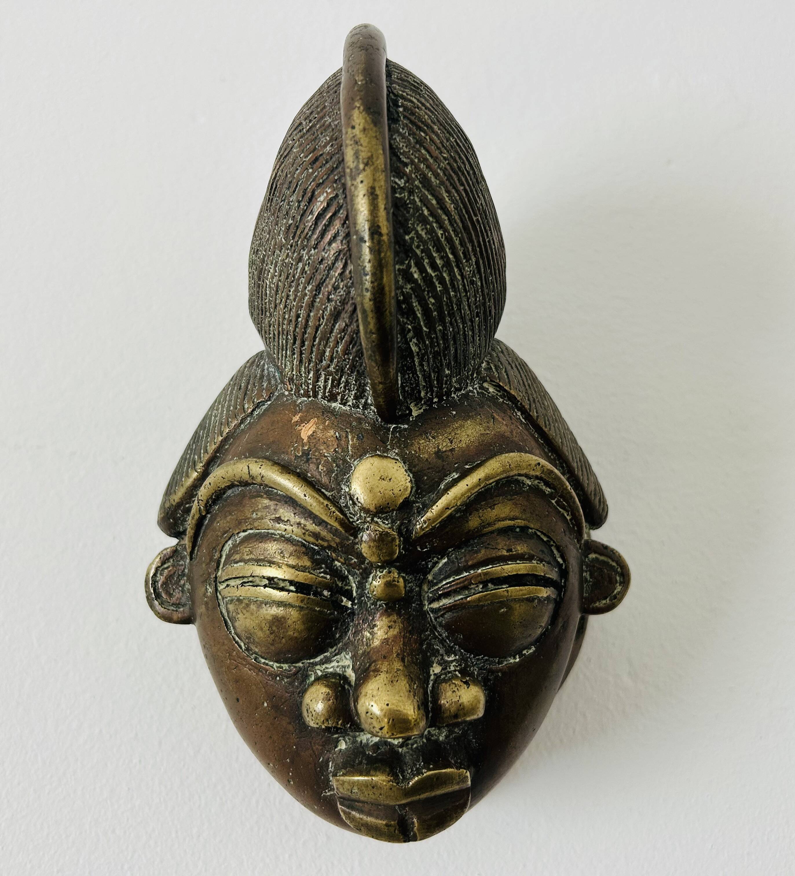 Masque en bronze africain, 19e siècle