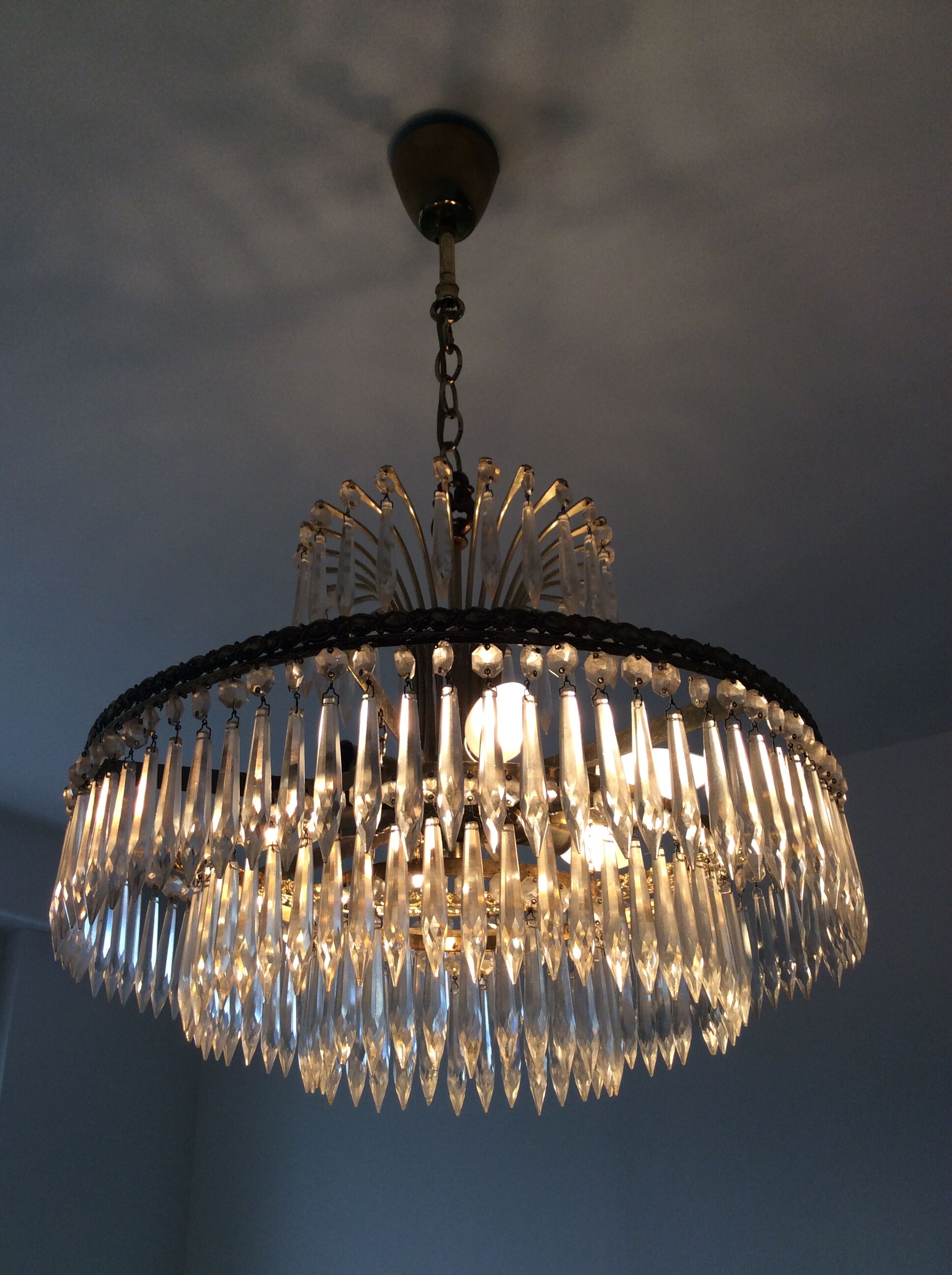 Old waterfall chandelier with grapevines and bronze