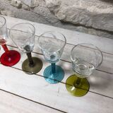 Antique and rare! Sold in a set of 12 colorful twisted stemmed glasses engraved with flowers and leaves