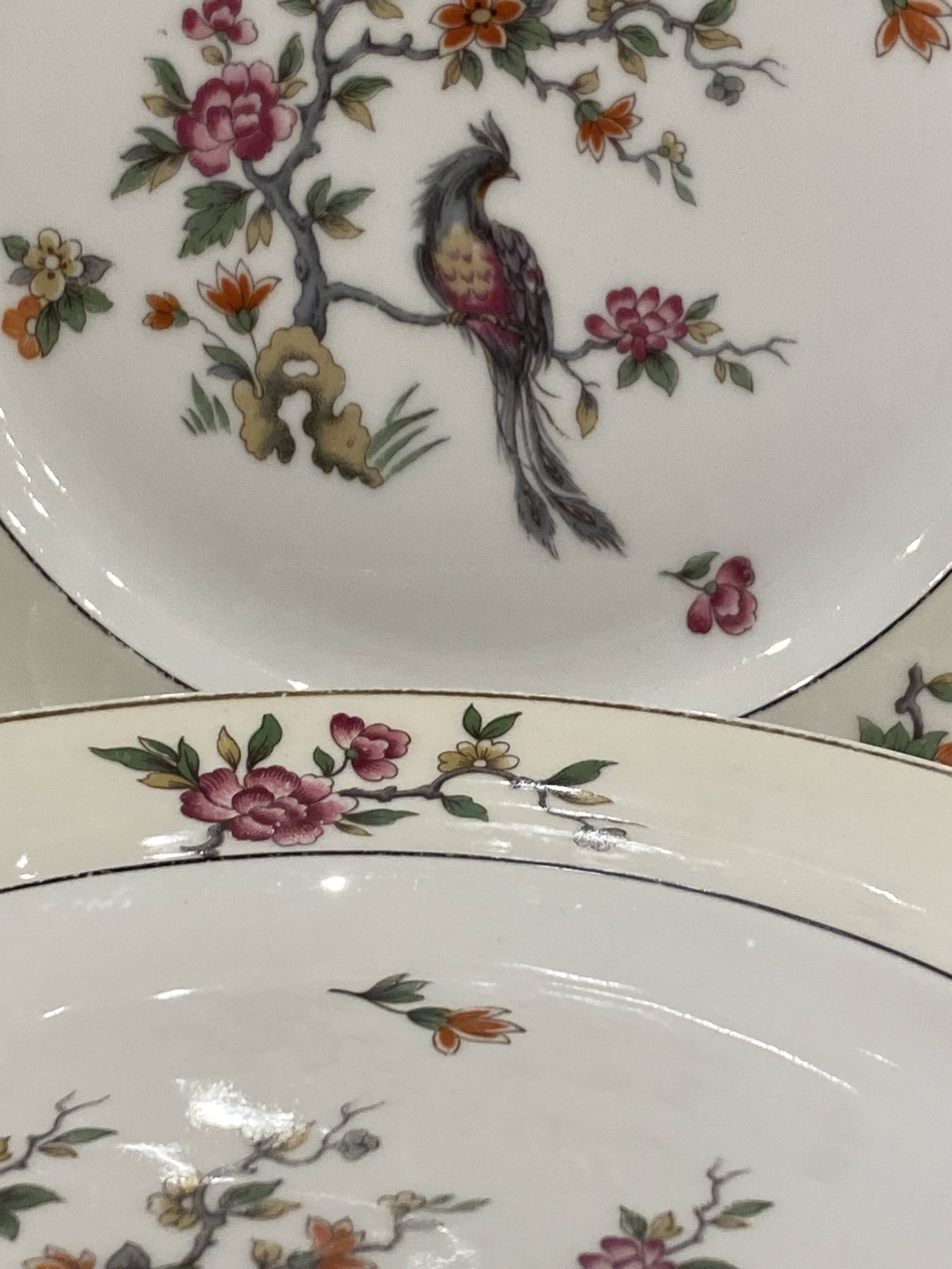 Set of 8 flat plates in Limoges porcelain