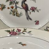Set of 8 flat plates in Limoges porcelain
