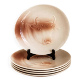 Saint Amand plates with cow head decoration.