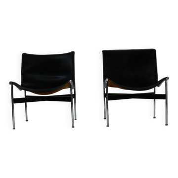 A set of two lounge chairs
