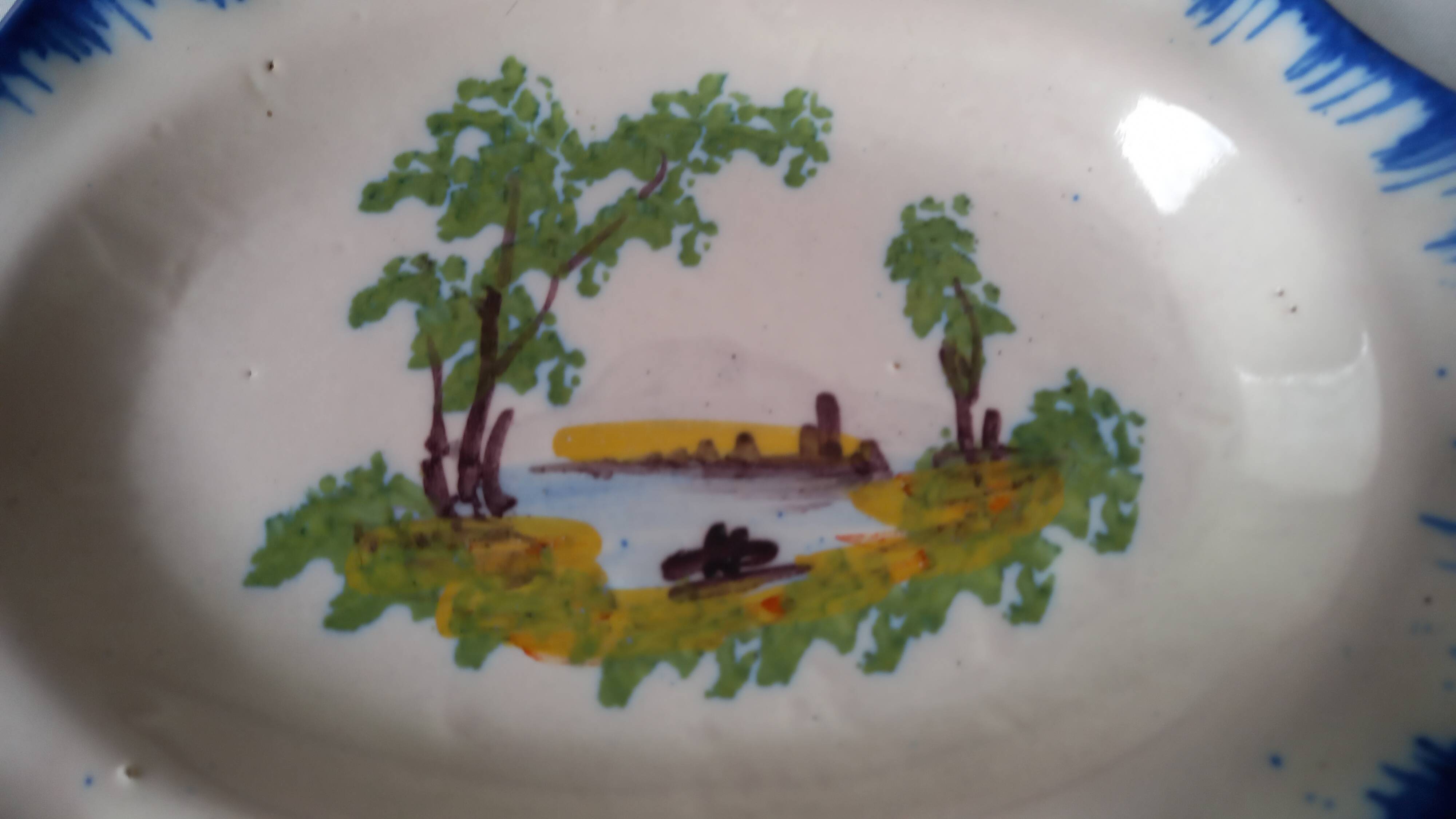 Oval dish with hand-painted decoration