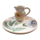 Set plate and jug with floral decoration.