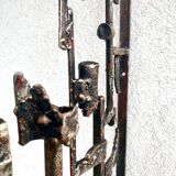 Brutalist iron coat rack by Salvino Marsura