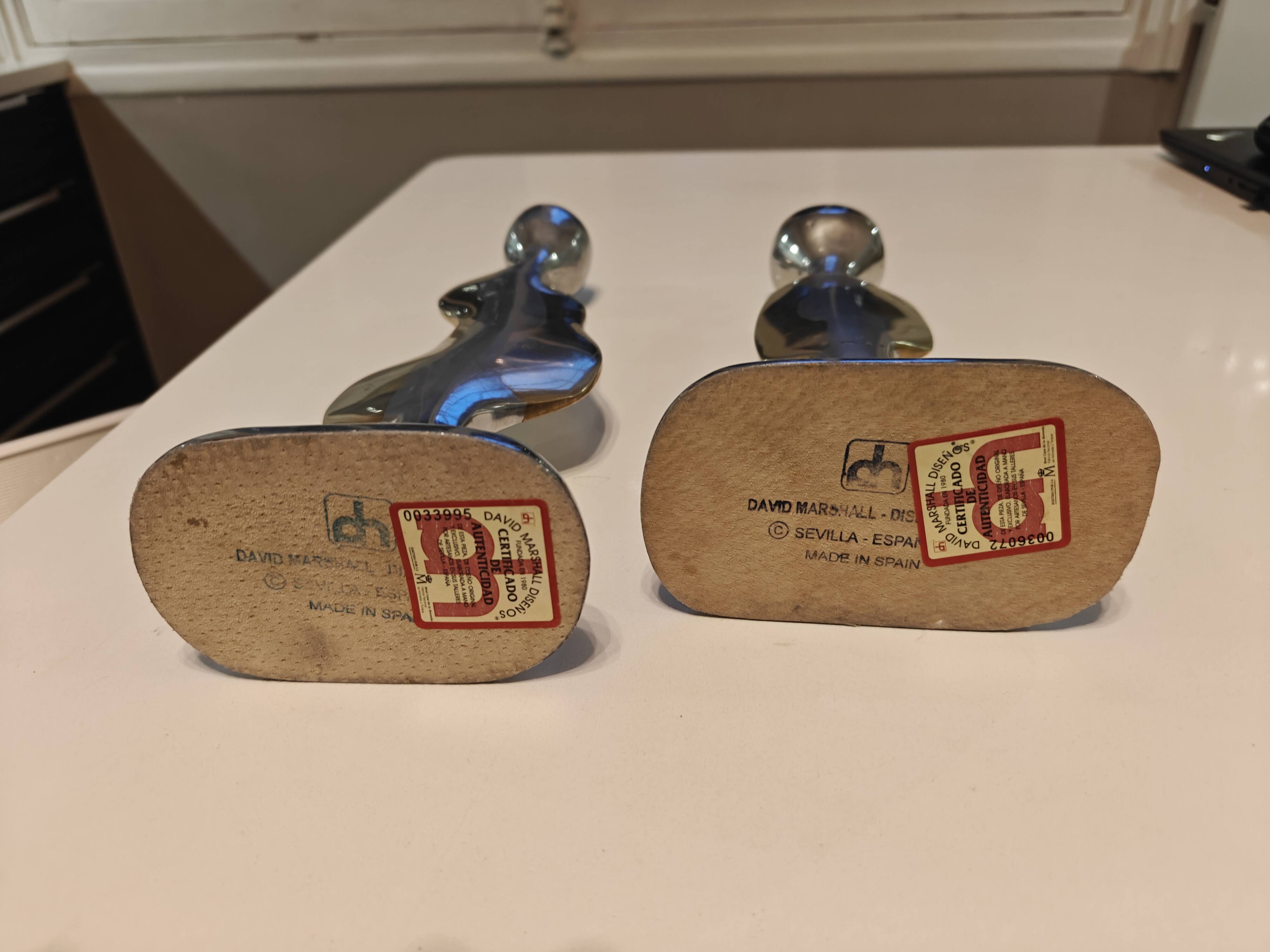 Pair of large candlesticks by David Marshall