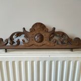 Old carved wooden pediment