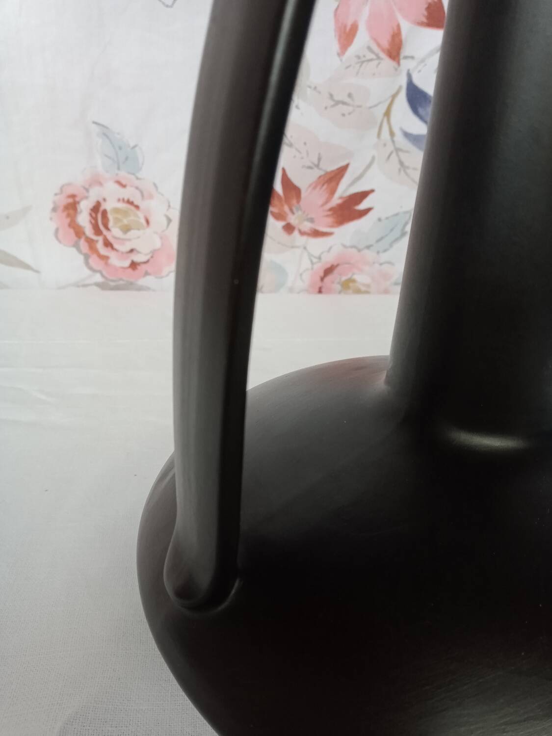Black ceramic handle vase