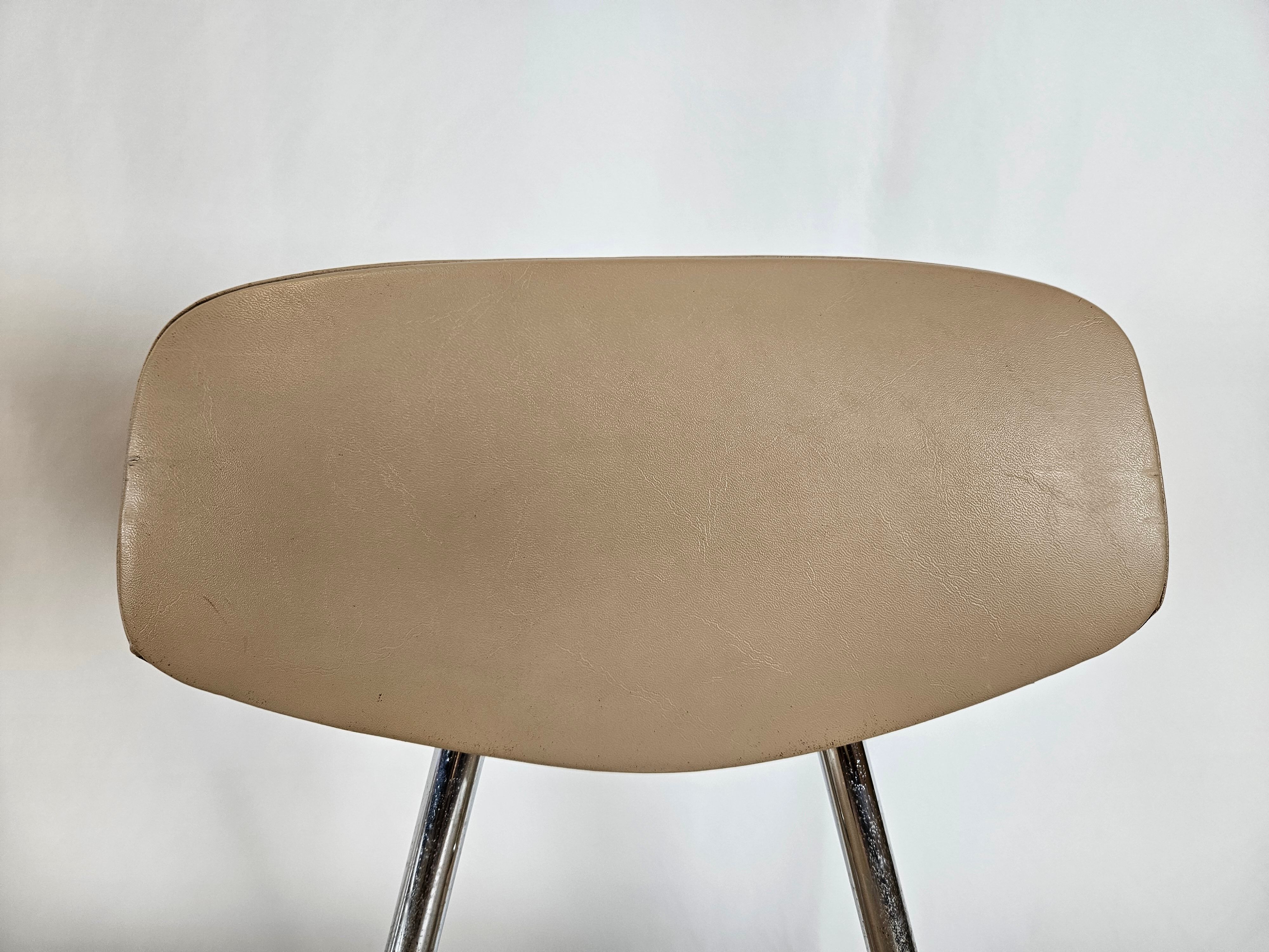 Set of four chairs in iron and skai 1970