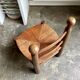 Low brutalist chair in dark wood and straw no. 2