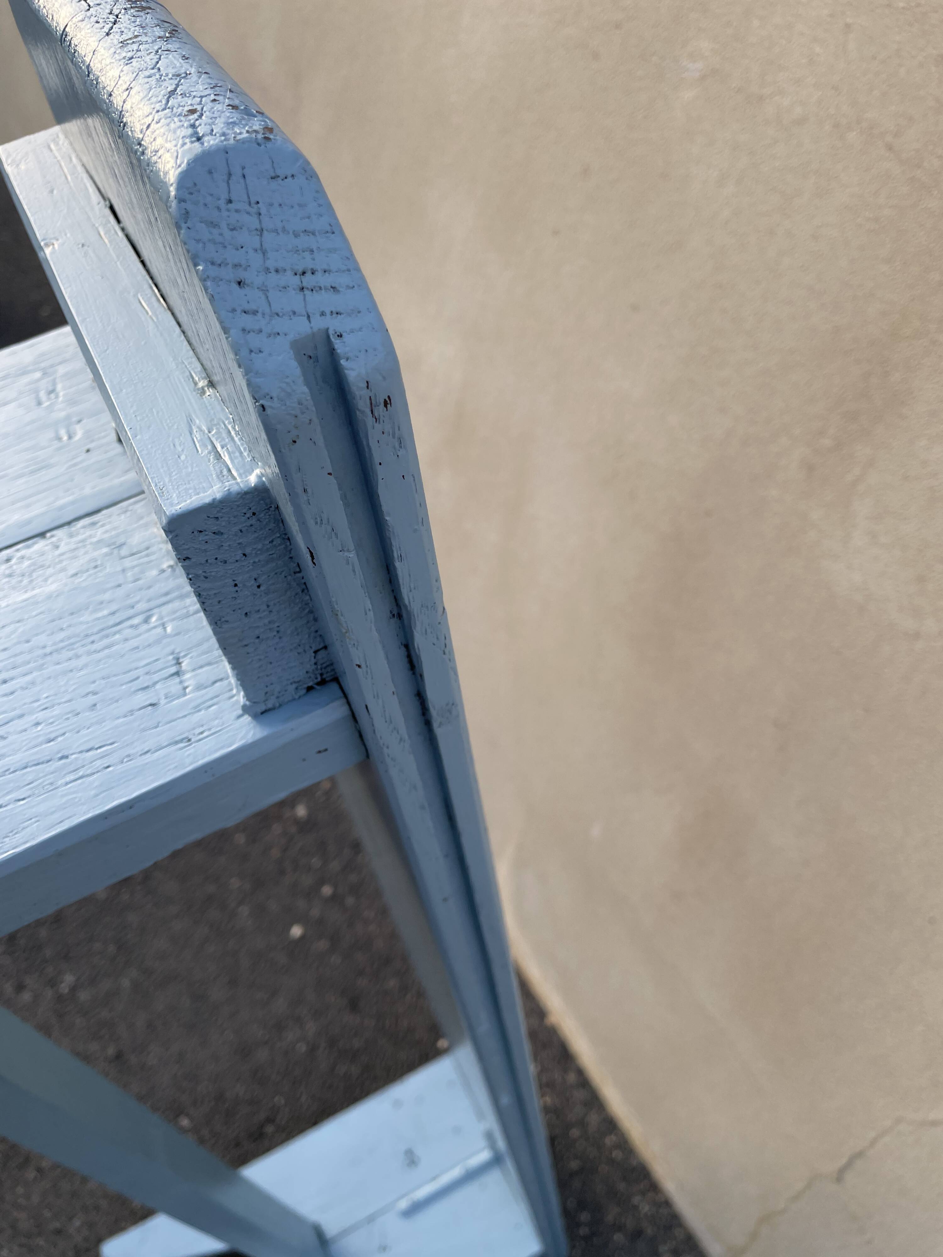 Blue painted wooden bench