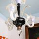 Small Venetian chandelier made of hand-blown Murano glass, lilac and pearlescent.
