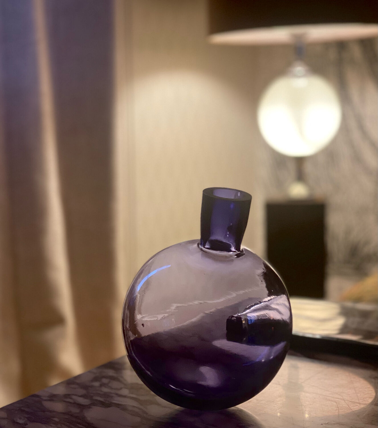 Purple vase inclined