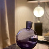 Purple vase inclined