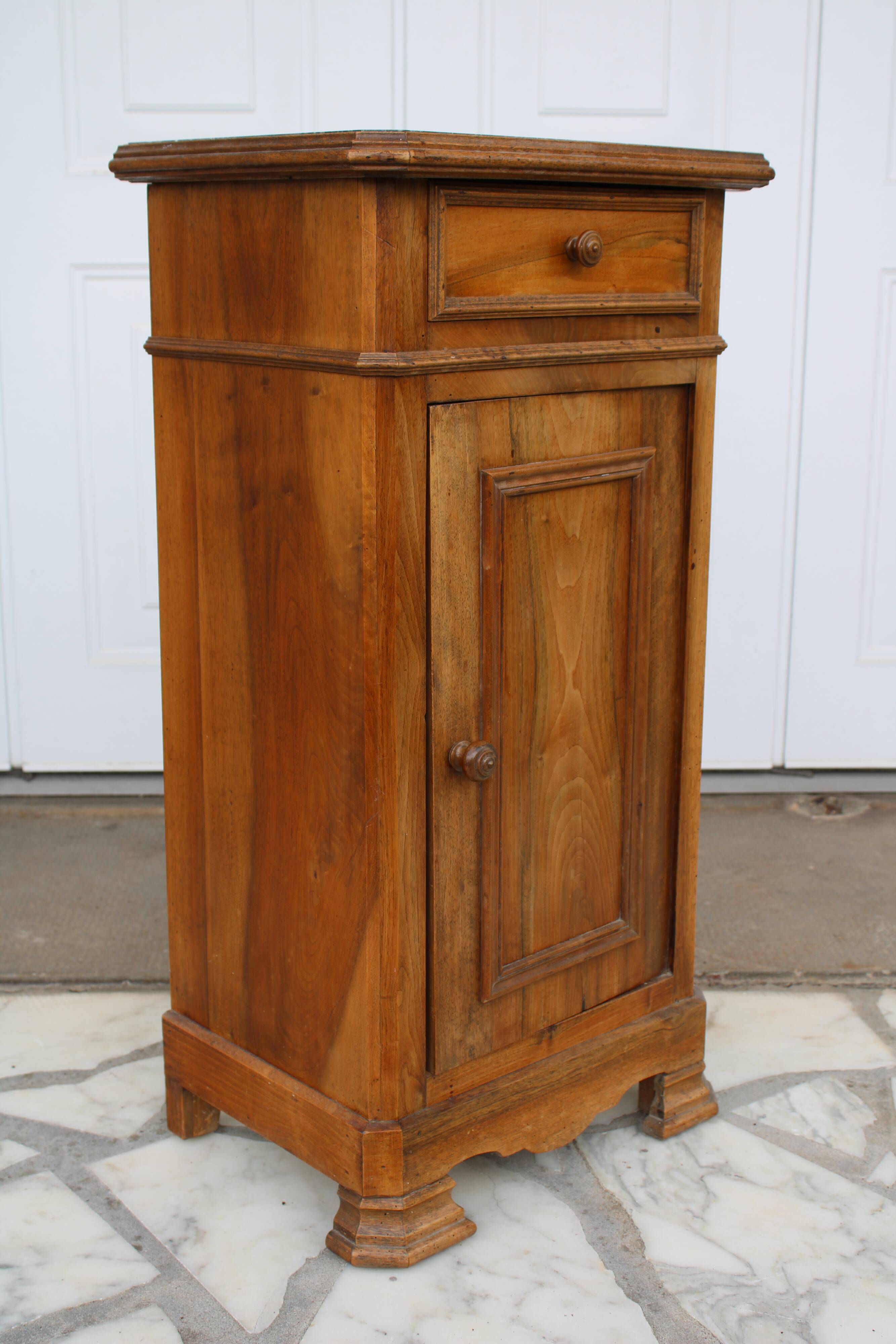 Antique bedside table with marble top