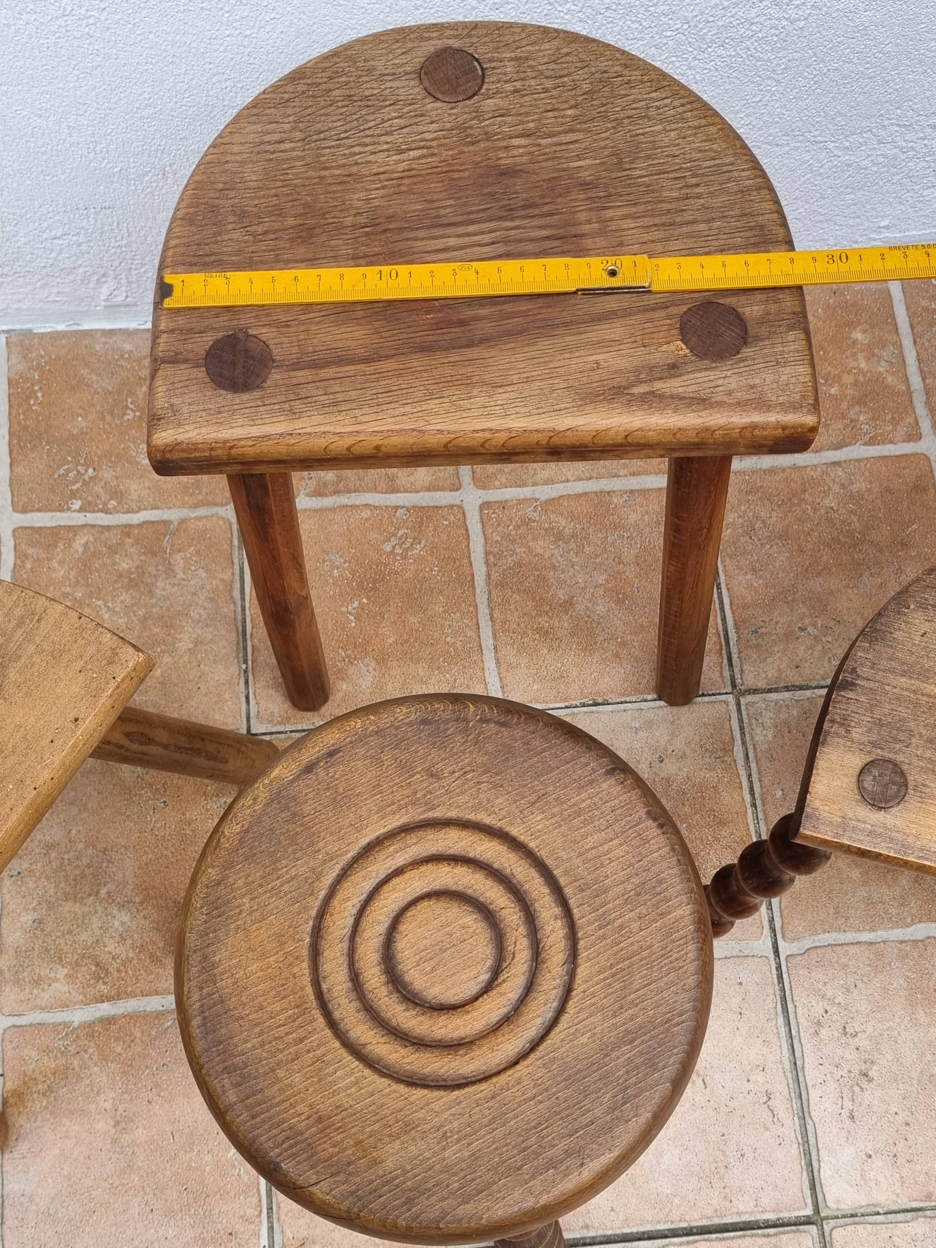 Set of four rustic solid wood plant holders, 31 to 43 cm