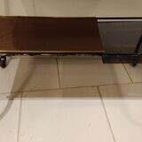 Red scoubidou handles wheeled serving table