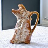 Antique zoomorphic pig carafe in foam-enameled stoneware