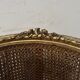 Louis XVI style armchair in wood and gilded stucco, 20th century.