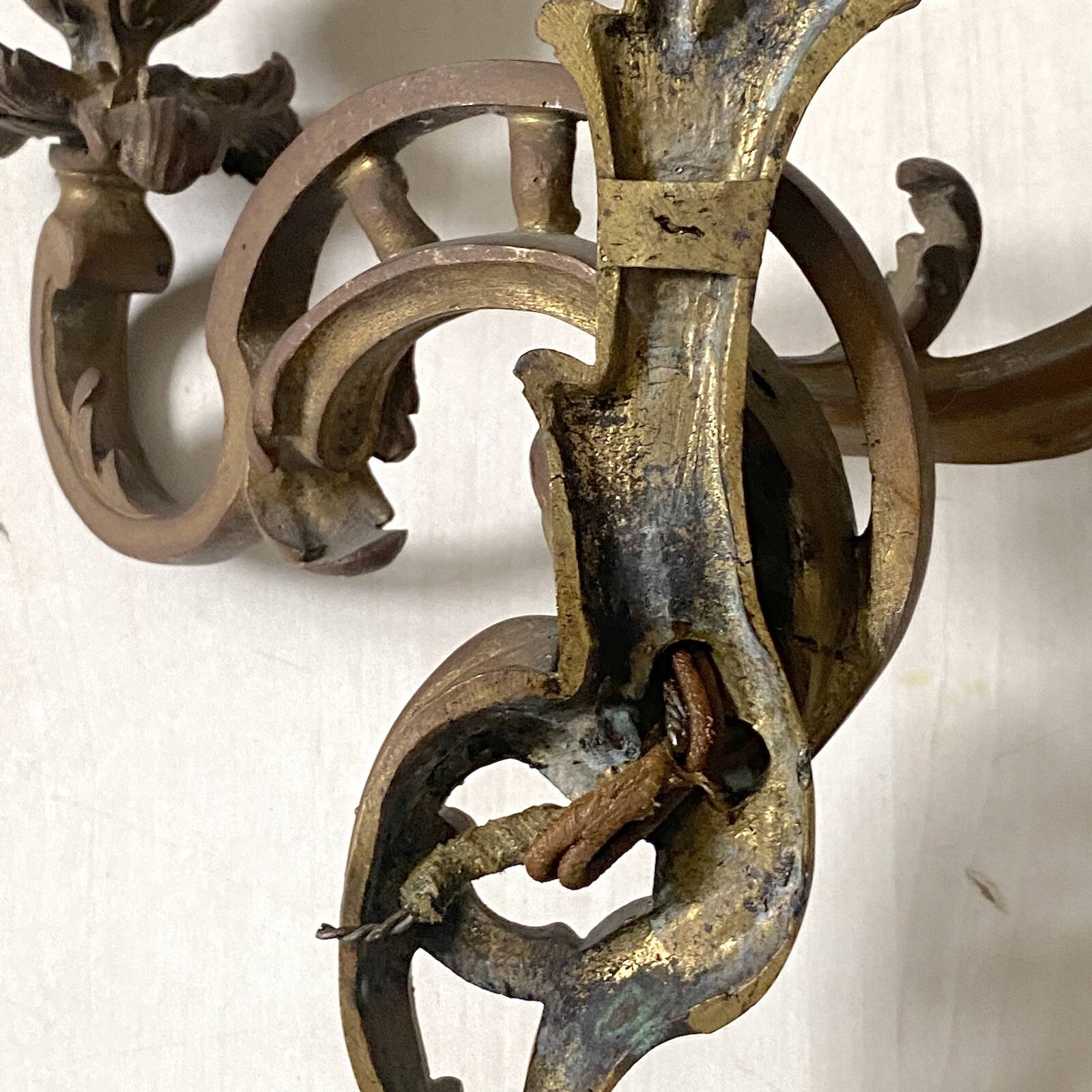 Pair of bronze wall sconces in Louis XV style
