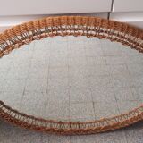 Oval mirror with woven rattan frame 63x47