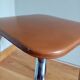 Caramel skaï stool and tapered feet in chrome metal