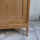 Charming vintage display cabinet from the 1950s in natural wood.