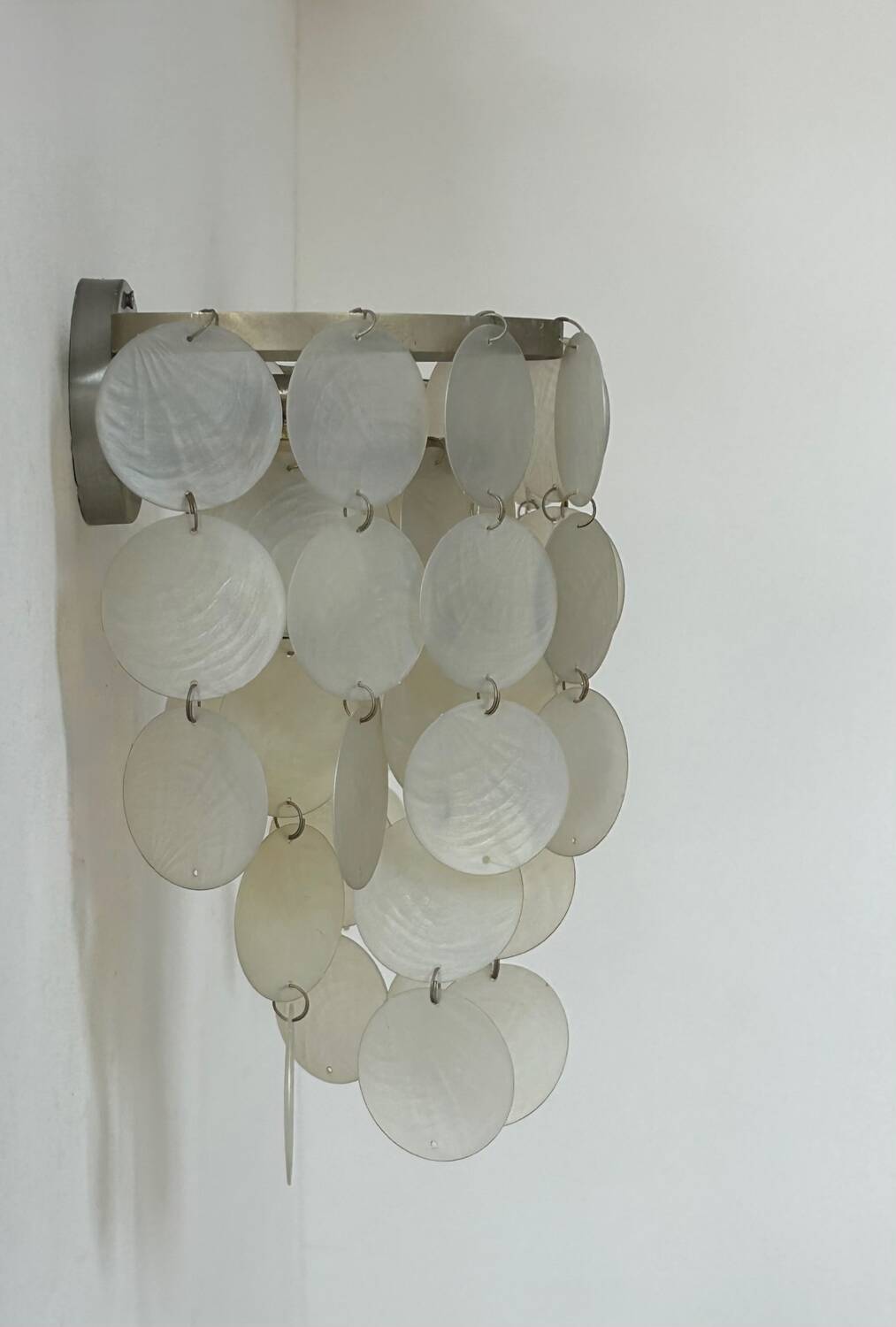 Pair of vintage mother-of-pearl and metal wall lights, France 1950s