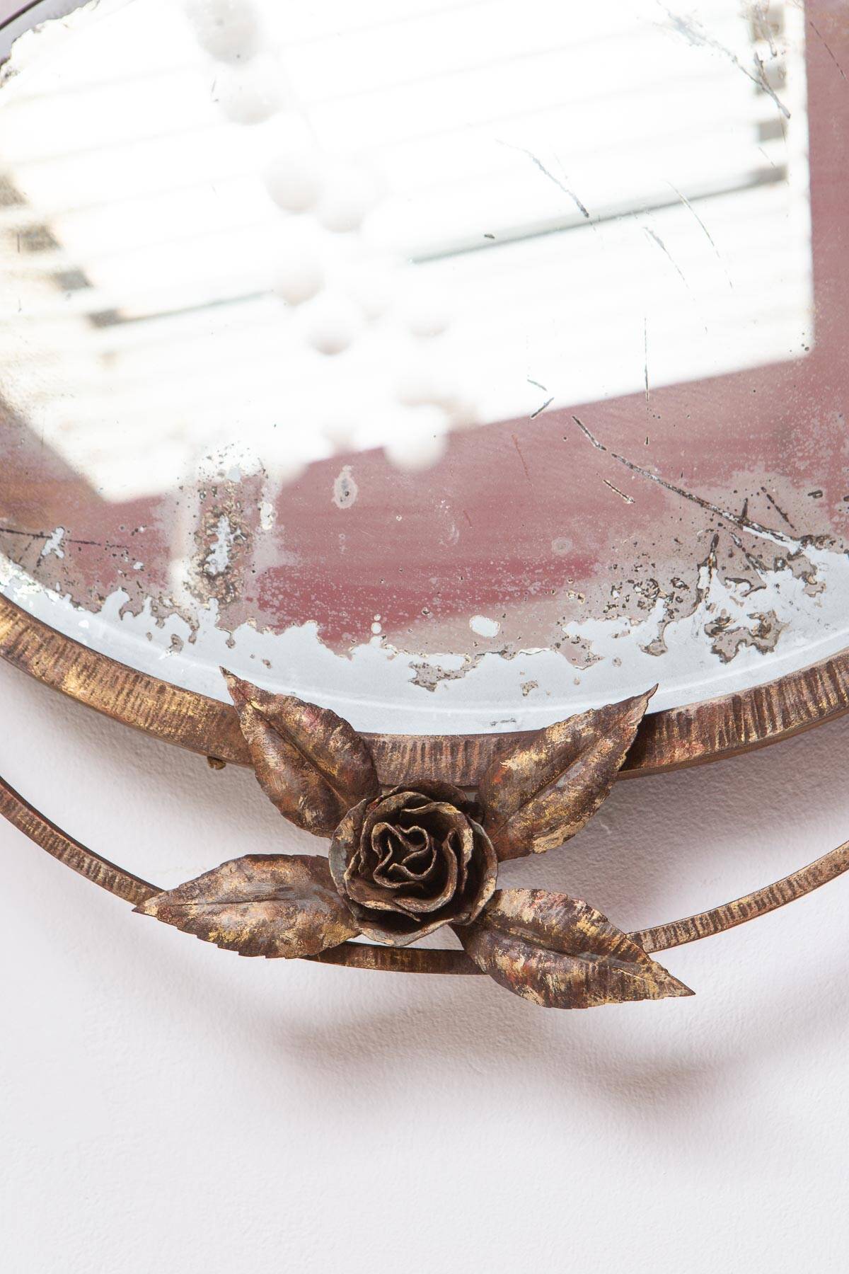 Old wrought iron mirror in the art deco style and period